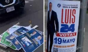 Hombre arranca carteles de candidatos dominicanos en calle de Nueva York