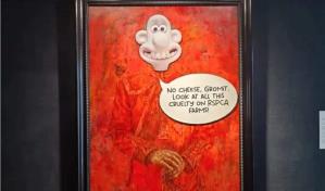 Animalistas cubren un retrato de Carlos III con una pegatina en una galería de Londres