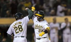 Atléticos remontan para superar a Mellizos, con jonrón de Langeliers