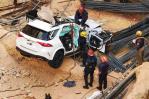 Dos muertos y dos heridos tras vehículo caer en construcción en el Distrito Nacional