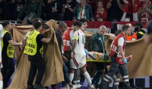 Delantero húngaro necesitará cirugía por fracturas faciales, UEFA defiende atención médica