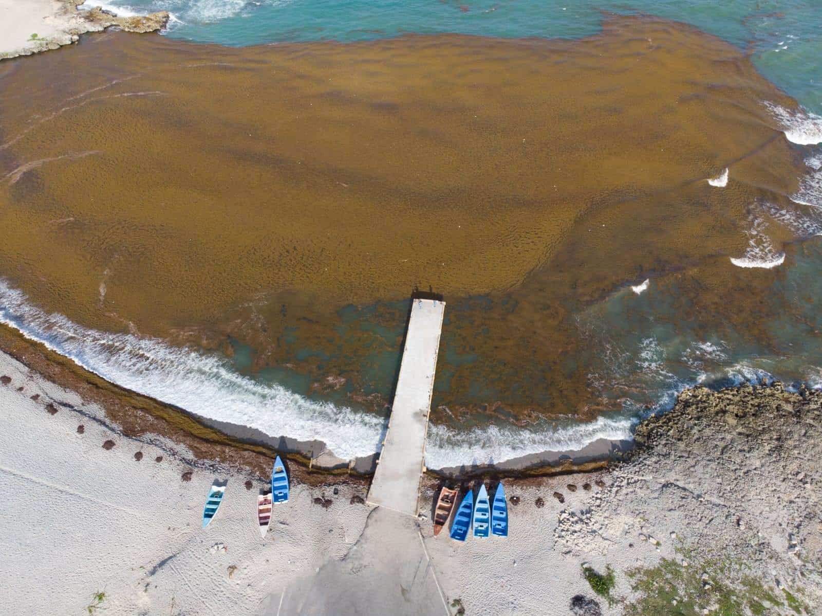 El muelle de Enriquillo antes del  huracán Beryl.