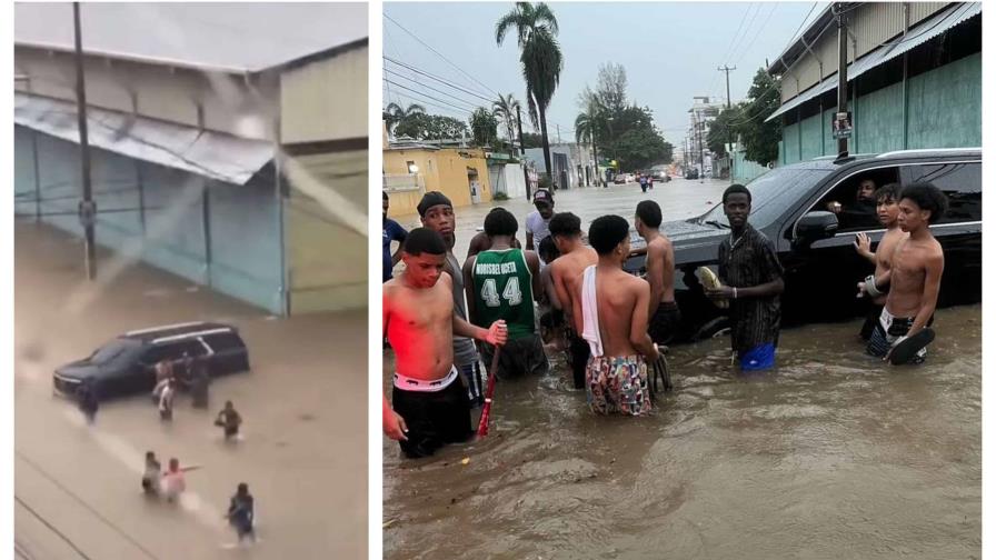 El vehículo del exponente urbano Shelow Shaq varado en una calle llena de agua por la vaguada