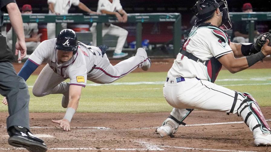 Marcell Ozuna impulsa carrera decisiva y Bravos vencen 5-4 a Dimondbacks en 11 innings