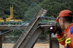 Suben a 38 los muertos por el colapso de un puente en China y 24 personas siguen desaparecidas Suben a 38 los muertos por el colapso de un puente en China y 24 personas siguen desaparecidas
