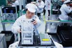 La producción industrial china ralentiza su avance hasta el 5.1 % en julio