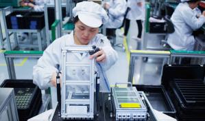 La producción industrial china ralentiza su avance hasta el 5.1 % en julio