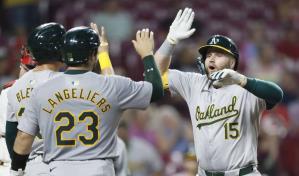 Brown aporta 2 jonrones y Atl&eacute;ticos se imponen 9-6 a Rojos