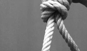 Hallan ahorcado a un detenido en un cuartel policial en Santiago