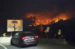 En pleno estado de calamidad, Portugal lucha contra 64 incendios activos