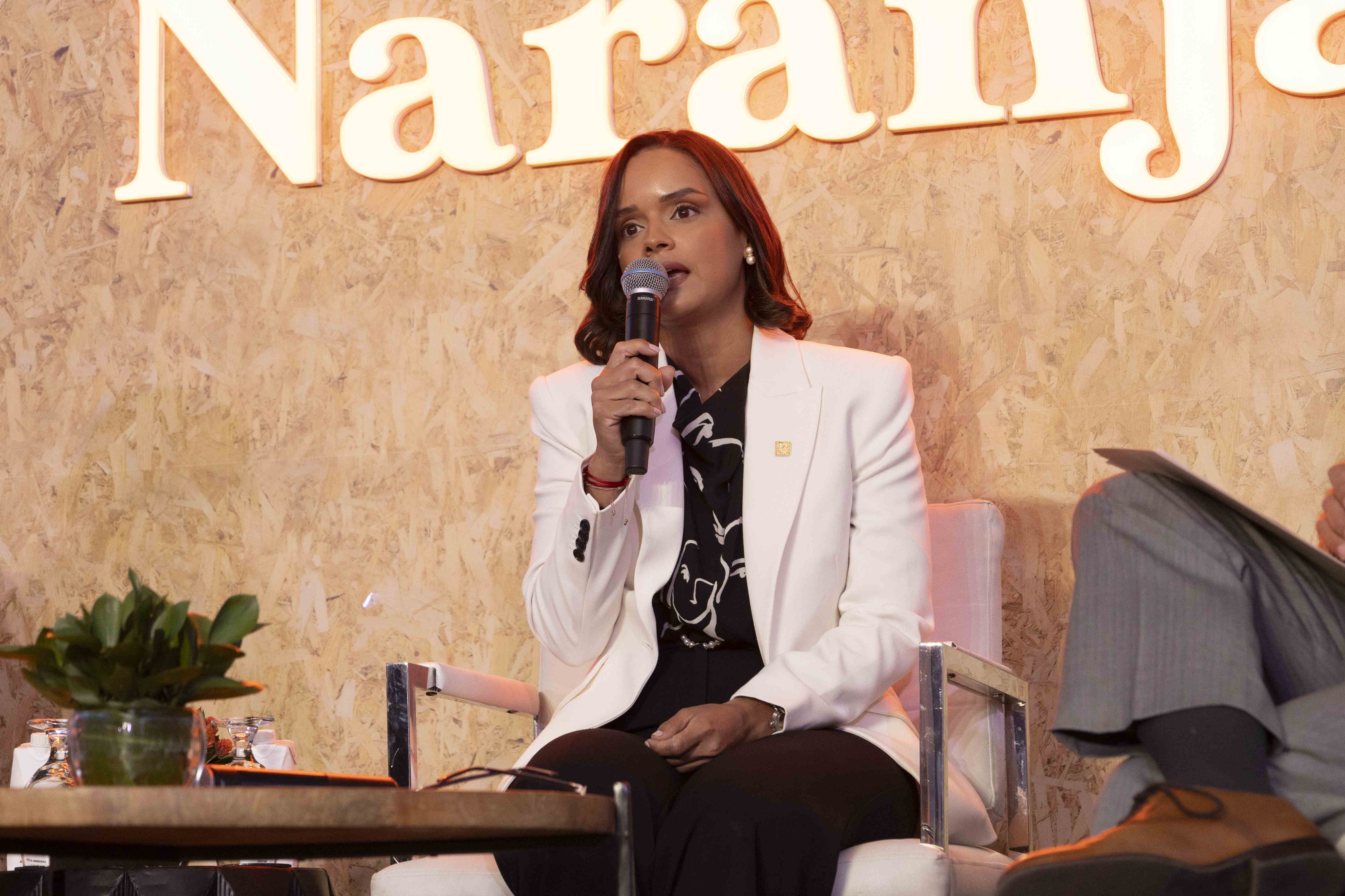 La vicepresidenta de Mercadeo de la entidad financiera, Yubelkis Ramírez Viñas, al participar del panel La banca en el sector de exportación naranja.