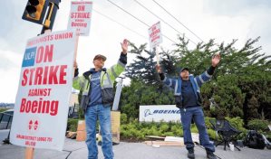 Boeing y trabajadores alcanzan acuerdo de principio para terminar huelga