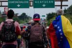 Miles de migrantes venezolanos arman una caravana hacia EE.UU. en el sur de México