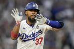 Teoscar Hernández celebra con lágrimas en sus ojos el campeonato mundial de los Dodgers