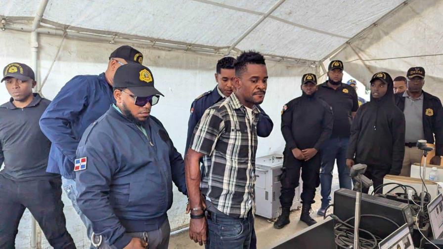 RD entrega miembro de una banda a la policía haitiana y multitud lo mata y quema de inmediato