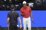 Tiger Woods debuta en la liga de golf bajo techo sin necesidad de presentación Tiger Woods debuta en la liga de golf bajo techo sin necesidad de presentación