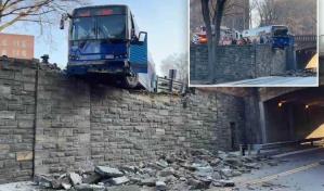 Un conductor se salva de milagro tras autobús quedar suspendido en un paso elevado en el Bronx