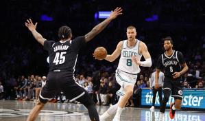 Porzingis anota 24 en su regreso y ayuda a Celtics a vencer a Nets