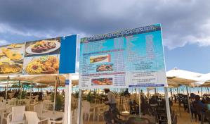 Negocios de Boca Chica muestran precios; cumplen disposición oficial