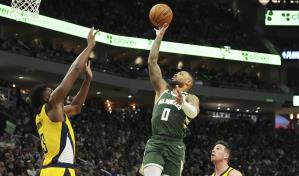 Trent iguala récord de Bucks en playoffs con nueve triples en victoria ante Pacers