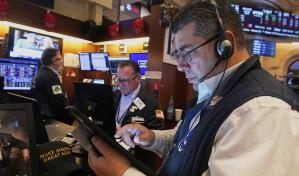 Wall Street abre en rojo mientras los inversores esperan la decisión de la Reserva Federal