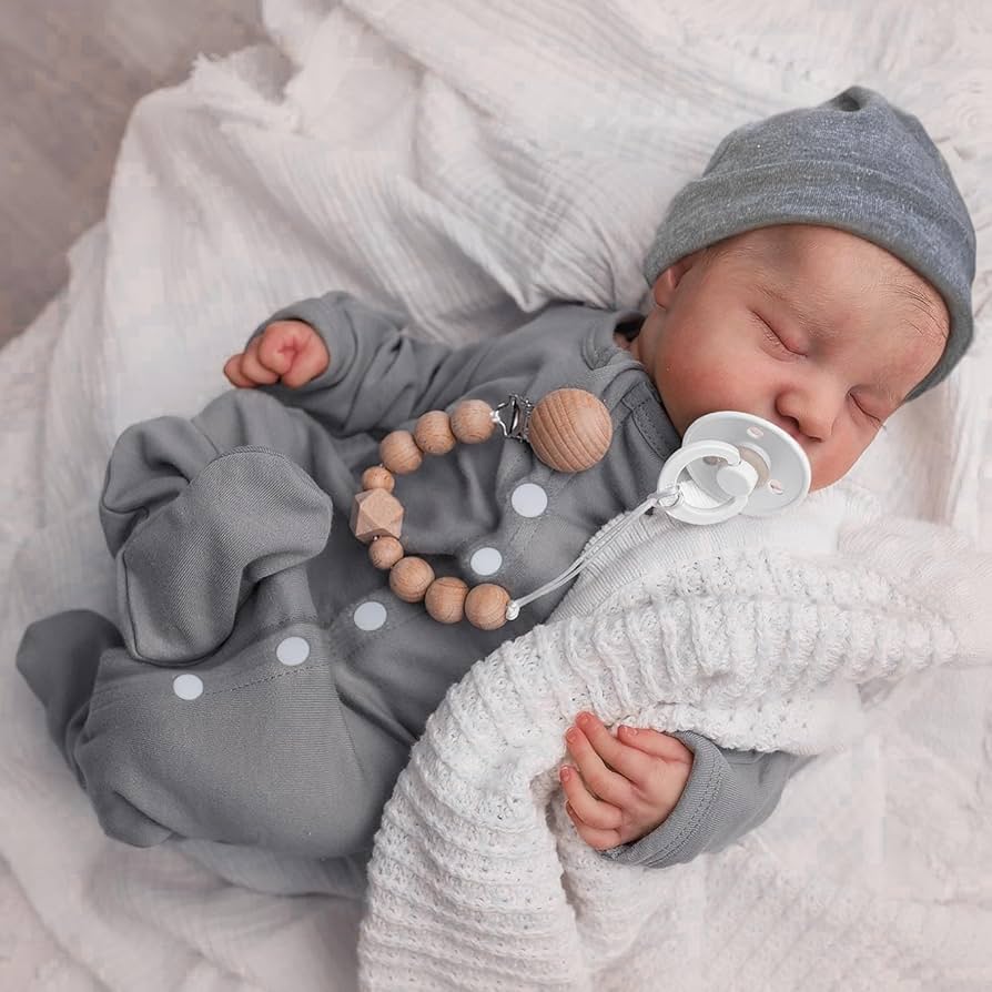 Bebé reborn recién nacido durmiendo.<br>