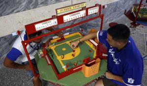 Béisbol en mesa: la versión a lo cubano del futbolín que busca pegar un jonrón Béisbol en mesa: la versión a lo cubano del futbolín que busca pegar un jonrón