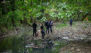 Más de 250 rescatistas buscan a la niña arrastrada por cañada en Villa Mella