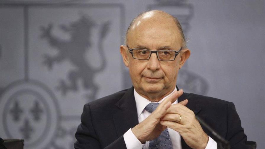 El exministro de Hacienda español del Gobierno de Rajoy (derecha) imputado por corrupción