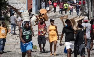 Cientos de desplazados en Haití intentan regresar a sus hogares tras retirarse las bandas