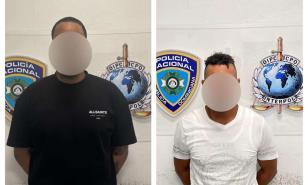 Interpol captura en el AILA cuando intentaban salir del país a dos hombres acusados de matar a tres