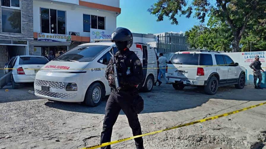 Suspenden a agentes de la Policía que ultimaron a cinco hombres en Santiago Suspenden a agentes de la Policía que ultimaron a cinco hombres en Santiago
