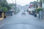 Lluvias causaron taponamientos y expusieron el deterioro vial en el Gran Santo Domingo