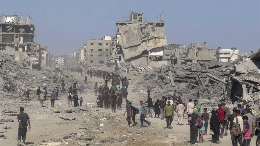 Los palestinos vuelven a una Ciudad de Gaza devastada