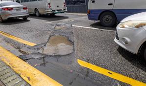 Lluvias de Melissa dejan al descubierto los hoyos en vías del Distrito Nacional