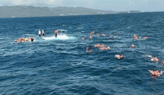 El catamarán y la isla de Miguel de Cuneo