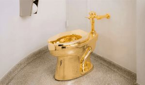 Un inodoro de oro del artista Maurizio Cattelan se vende por US$12.1 millones en subasta