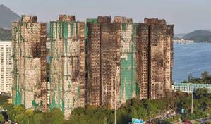 Hong Kong eleva a 128 muertos el saldo de su peor incendio en décadas