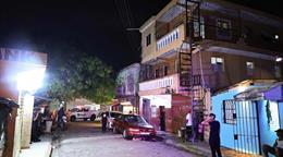 Apresan mujer que cedi&oacute; yipeta del tiroteo en Villa Duarte que dej&oacute; dos muertos; hay tres pr&oacute;fugos