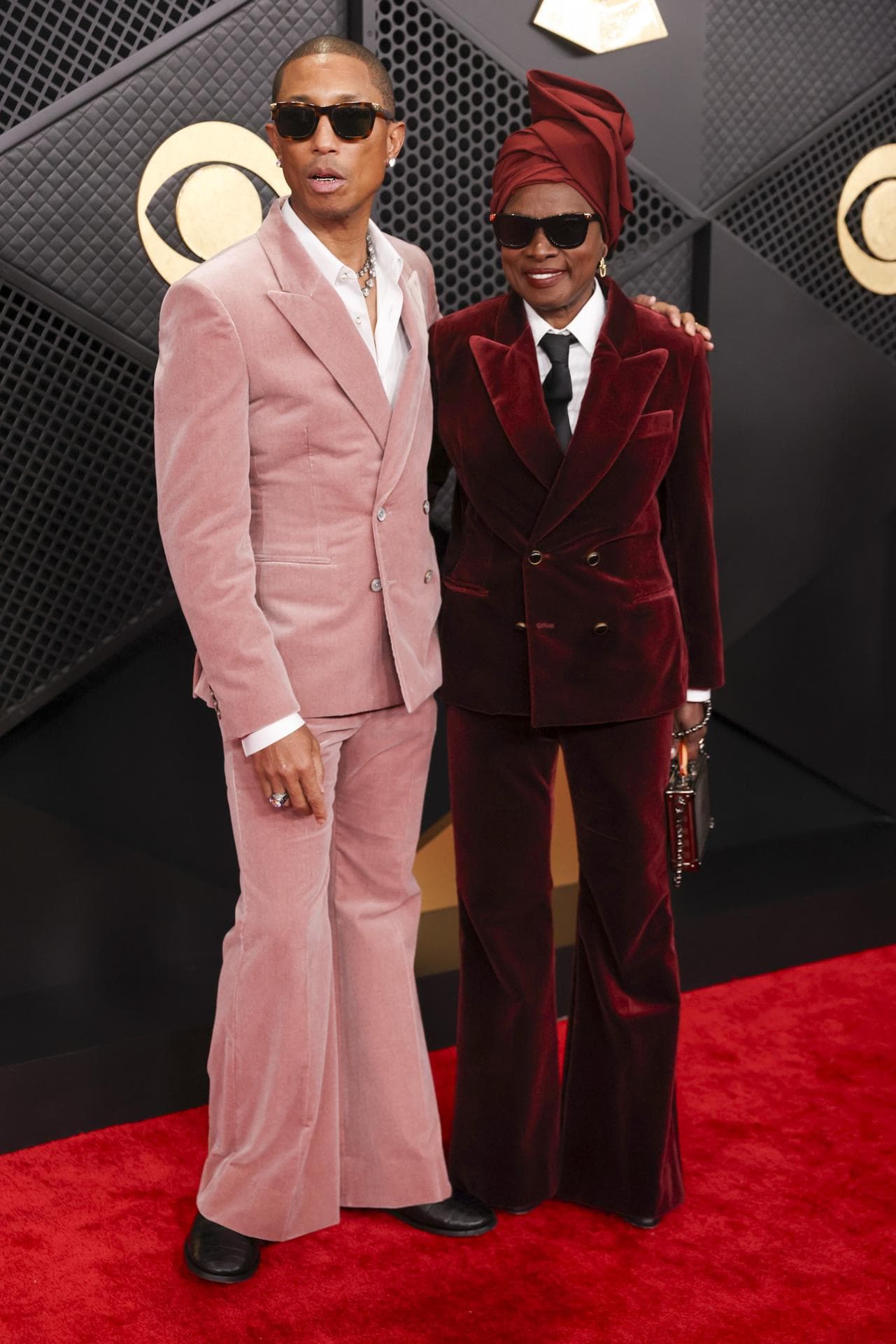 El m&uacute;sico y productor Pharrell Williams y la m&uacute;sico y actriz beninesa Ang&eacute;lique Kidjo.