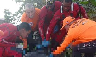 Defensa Civil recupera el cuerpo del motorista que cay&oacute; al r&iacute;o Isabela durante accidente de tr&aacute;nsito