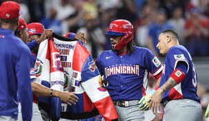 El "clubby" detr&aacute;s de la historia de la chaqueta tricolor del jonr&oacute;n dominicano