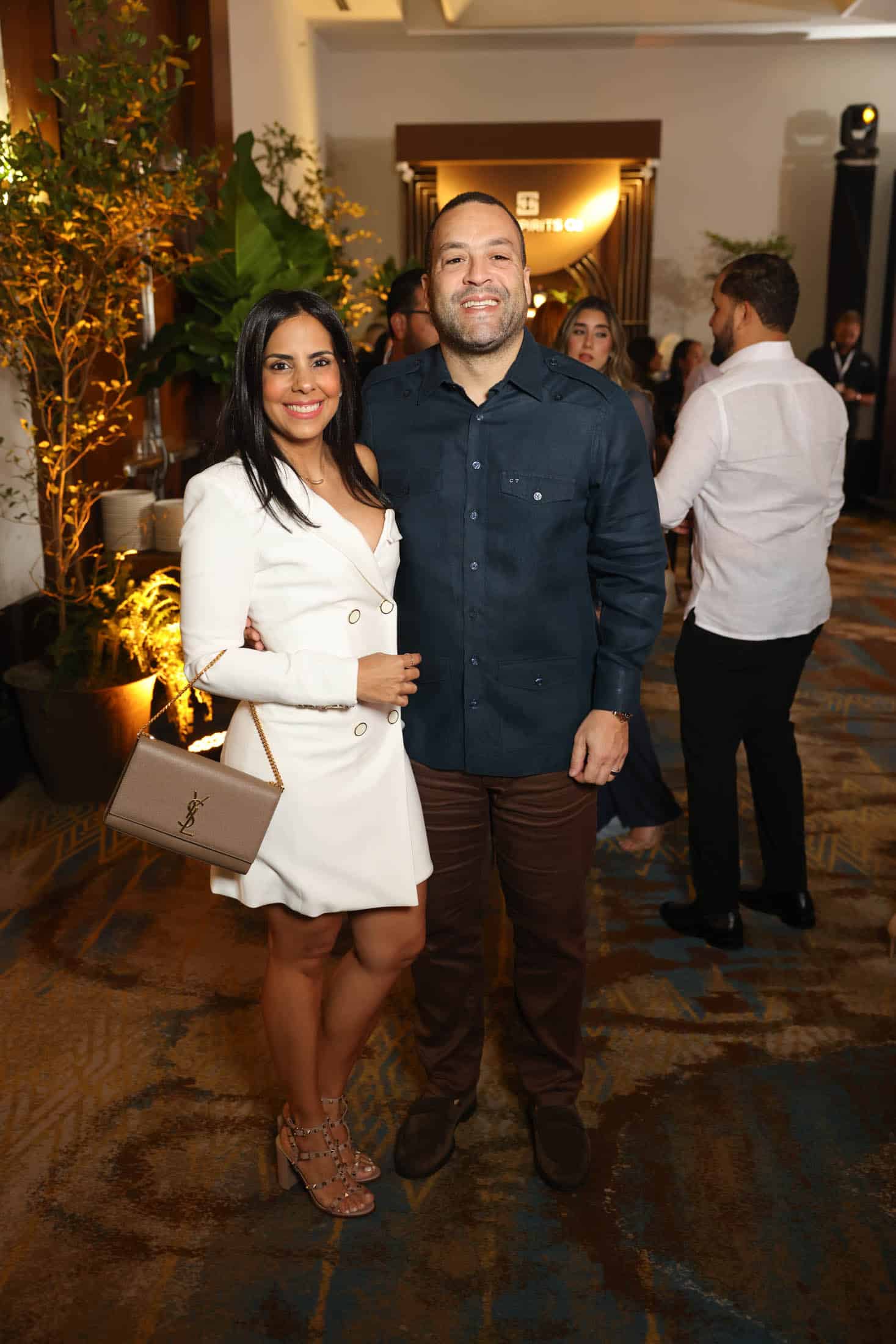 Sarah Rojas y Carlos Then.