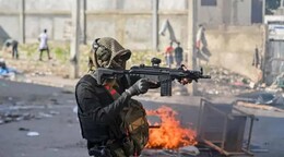 Polic&iacute;a y bandas se enfrentan a tiros en &aacute;rea donde ocurri&oacute; masacre de civiles en Hait&iacute;