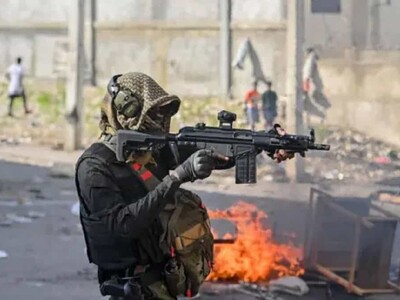 Policía y pandillas se enfrentan en áreas de masacre en Haití