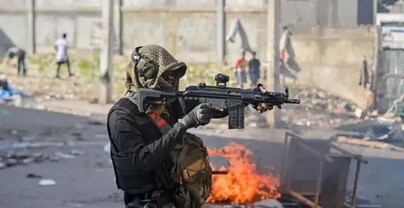 Polic&iacute;a y bandas se enfrentan a tiros en &aacute;rea donde ocurri&oacute; masacre de civiles en Hait&iacute;