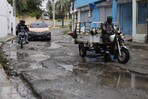 Calles en mal estado y cúmulo de basura, problemas que afectan sectores de Santo Domingo Este Calles en mal estado y cúmulo de basura, problemas que afectan sectores de Santo Domingo Este