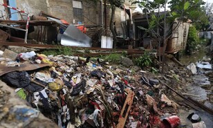 Basura en ca&ntilde;adas, principal causa de inundaciones en Santo Domingo, dice la Caasd