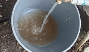 Debido las lluvias, el agua llega turbia a sectores de Santiago