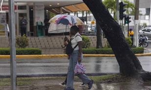 COE ampl&iacute;a alerta verde en 16 provincias y el Distrito Nacional por aguaceros